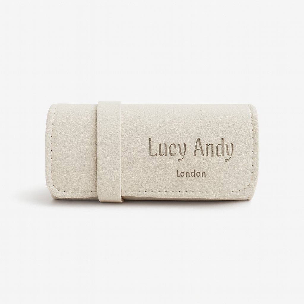 White jewelry case with 'Lucy Andy London' branding on a white background