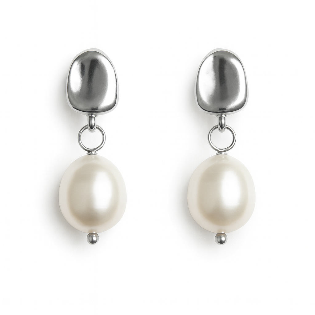 Pair of earrings with metallic teardrop pendants and pearl drops on a white background