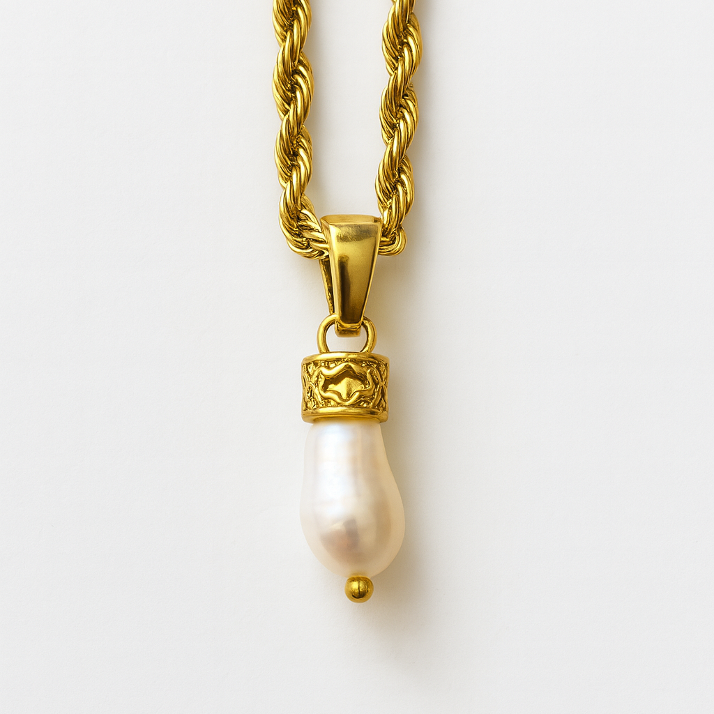 Gold necklace with a pearl pendant on a white background
