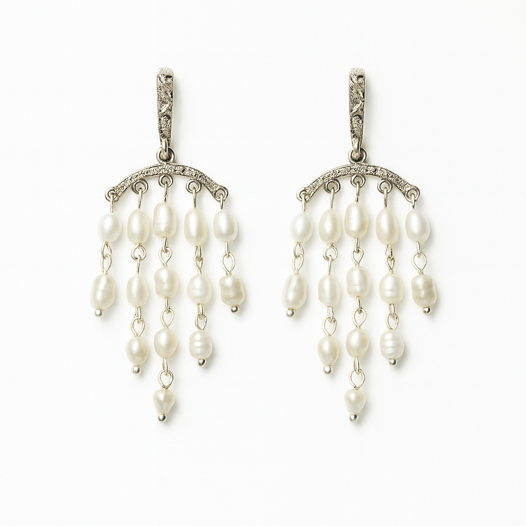 Pair of pearl earrings on a white background