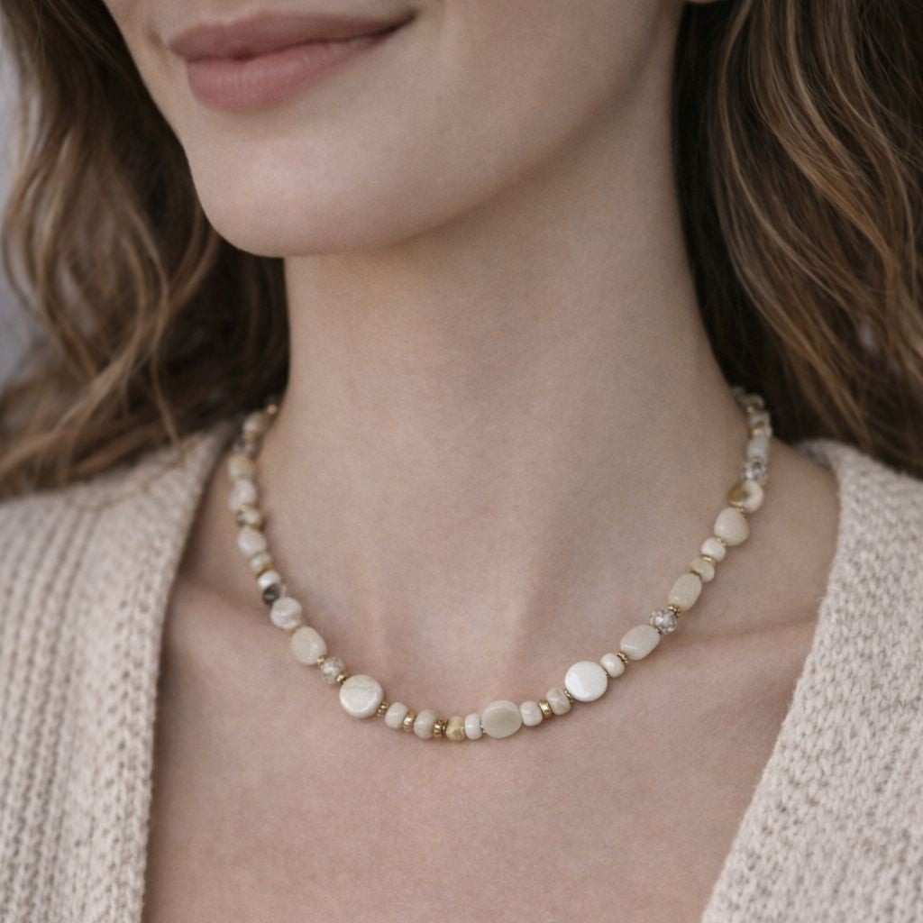 model wear handmade necklace with neutral beads 