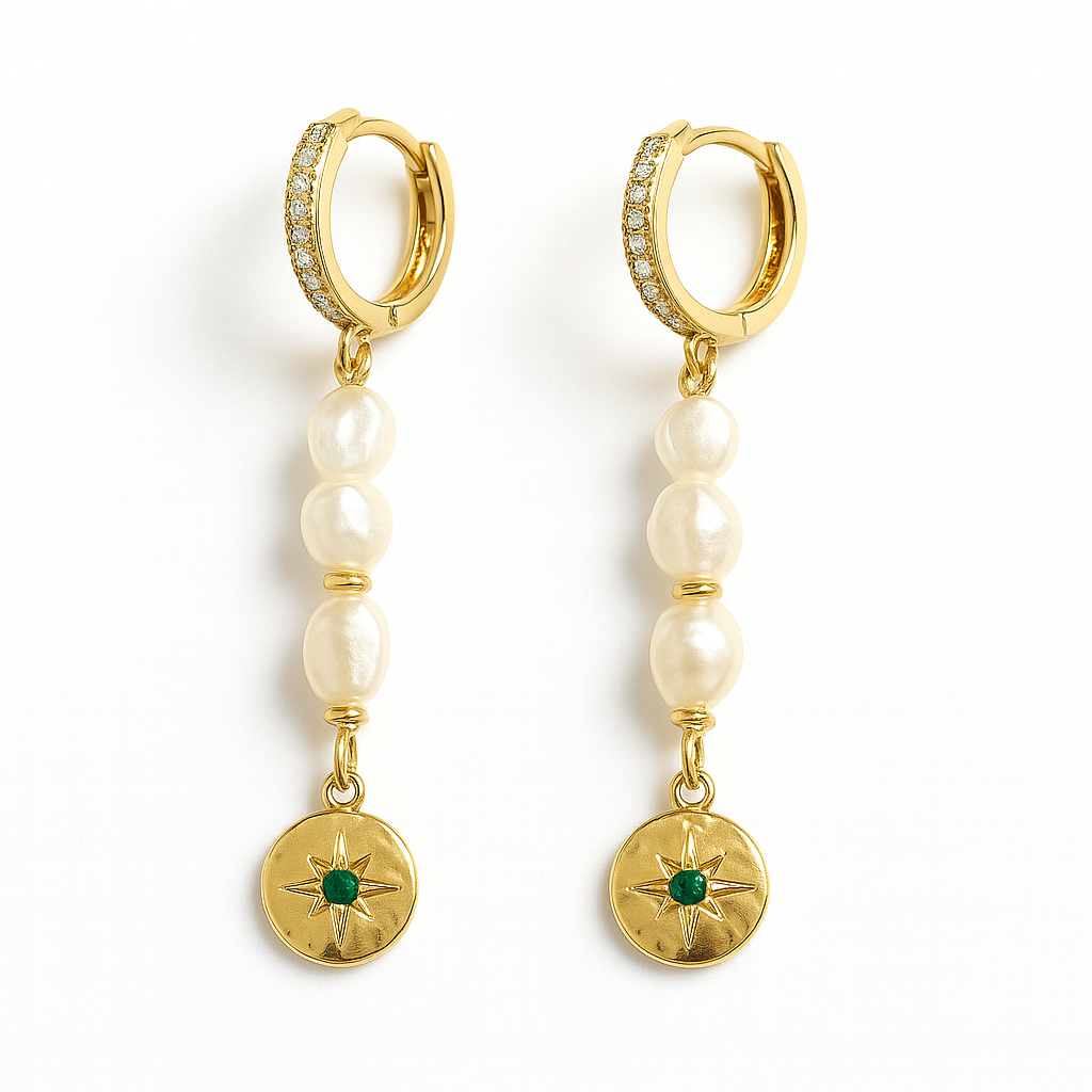 Gold hoop earrings with pearl beads and green gemstone charms on a white background