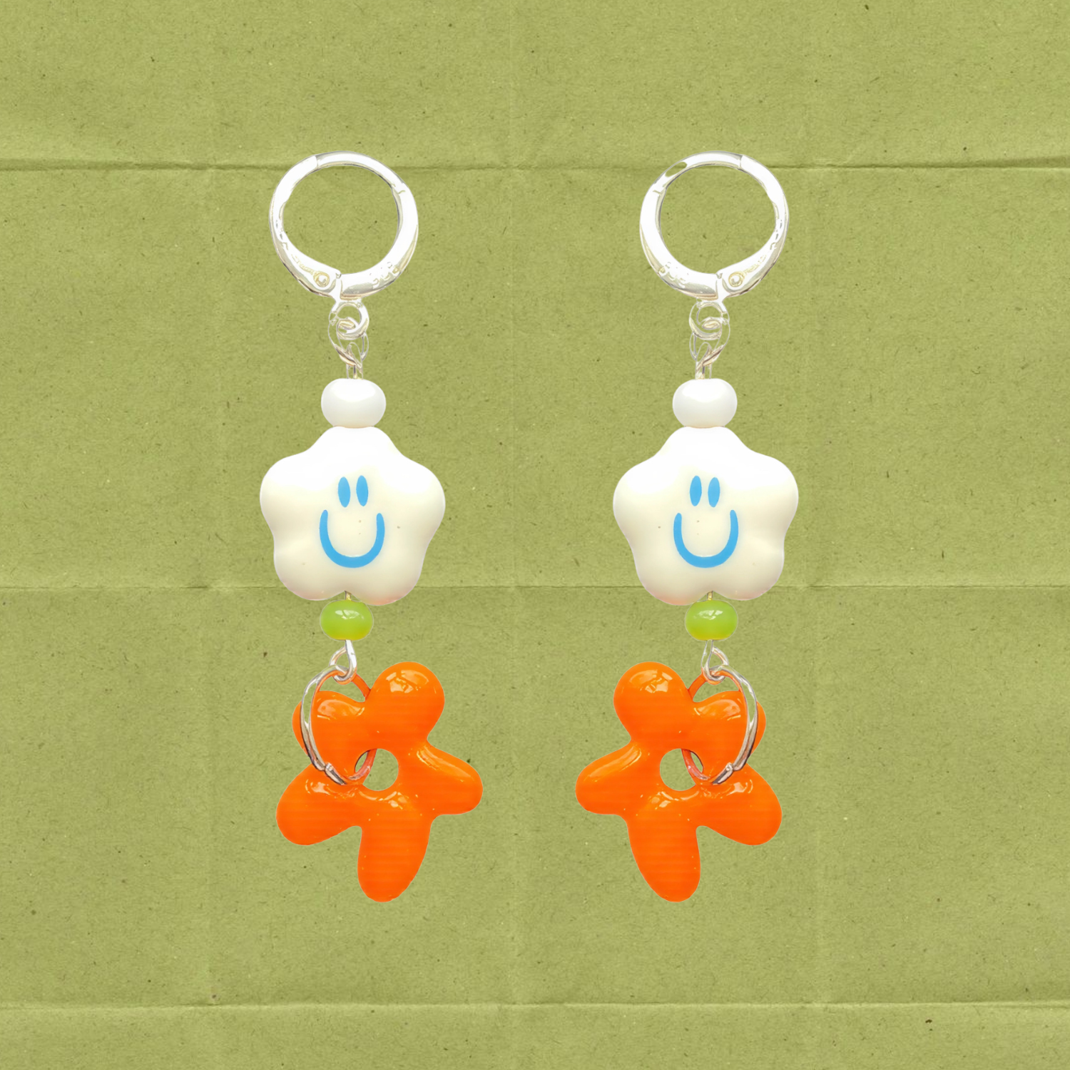 Happy Flower Huggies – Sterling Silver Earrings with Acrylic Smiley & Orange Flower Charms