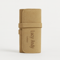 Tan leather case with 'Lucy Andy' branding on a white background