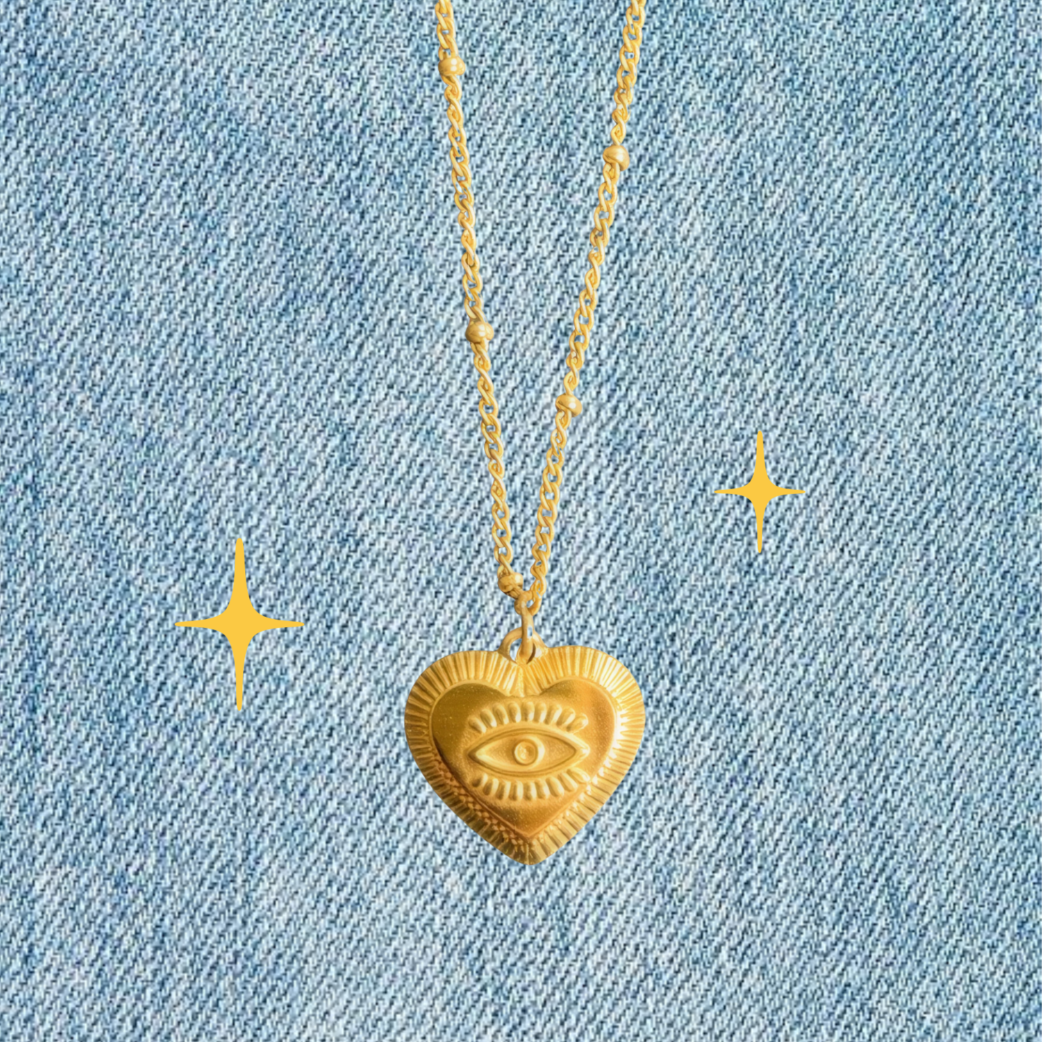 The Heart Sees – 18K Gold Necklace with Embossed Heart & Eye Pendant