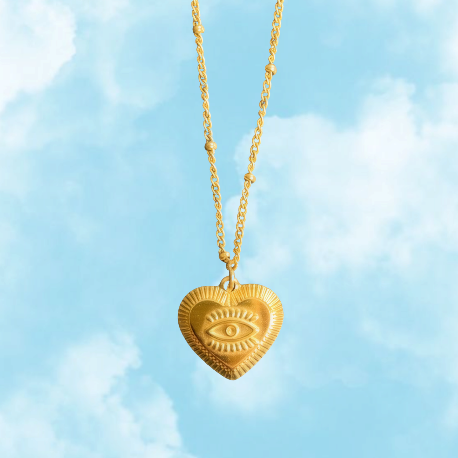 The Heart Sees – 18K Gold Necklace with Embossed Heart & Eye Pendant