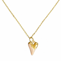 Gold heart-shaped pendant on a gold chain against a white background