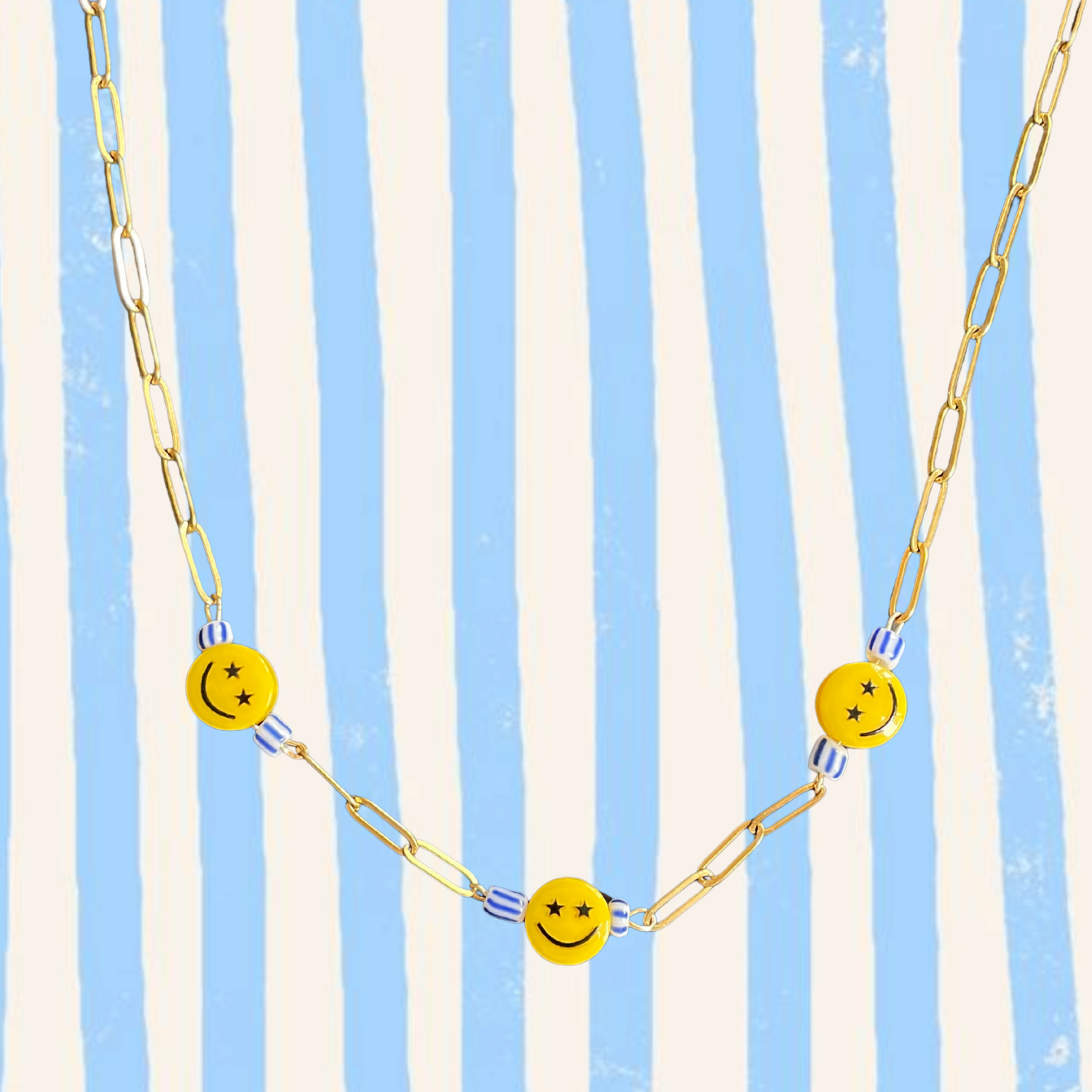 Smile – Playful Smiley Face Necklace with Striped Beads (Gold)