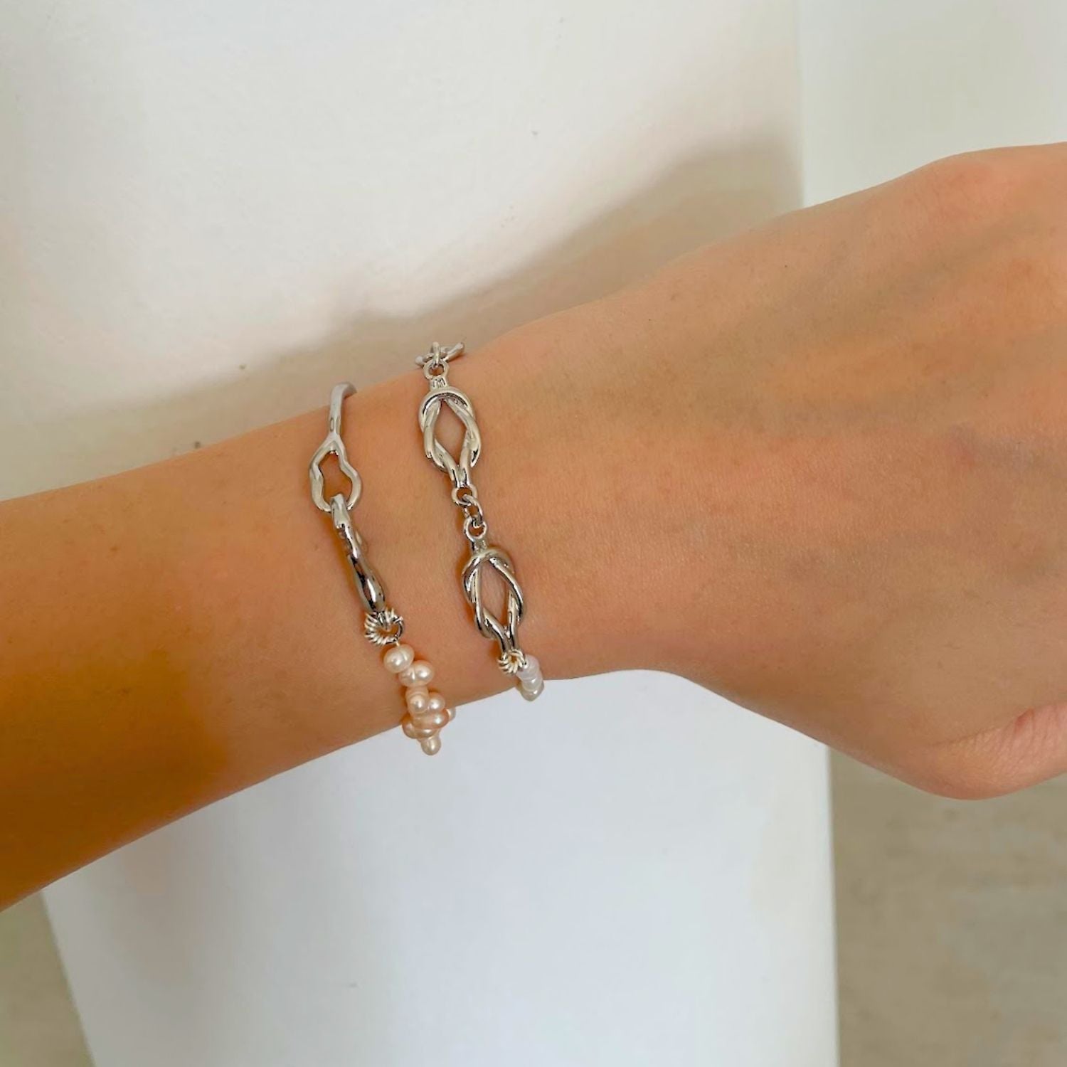 Silver Bracelet With Freshwater Cultured White Pearls – T Clasp Design.