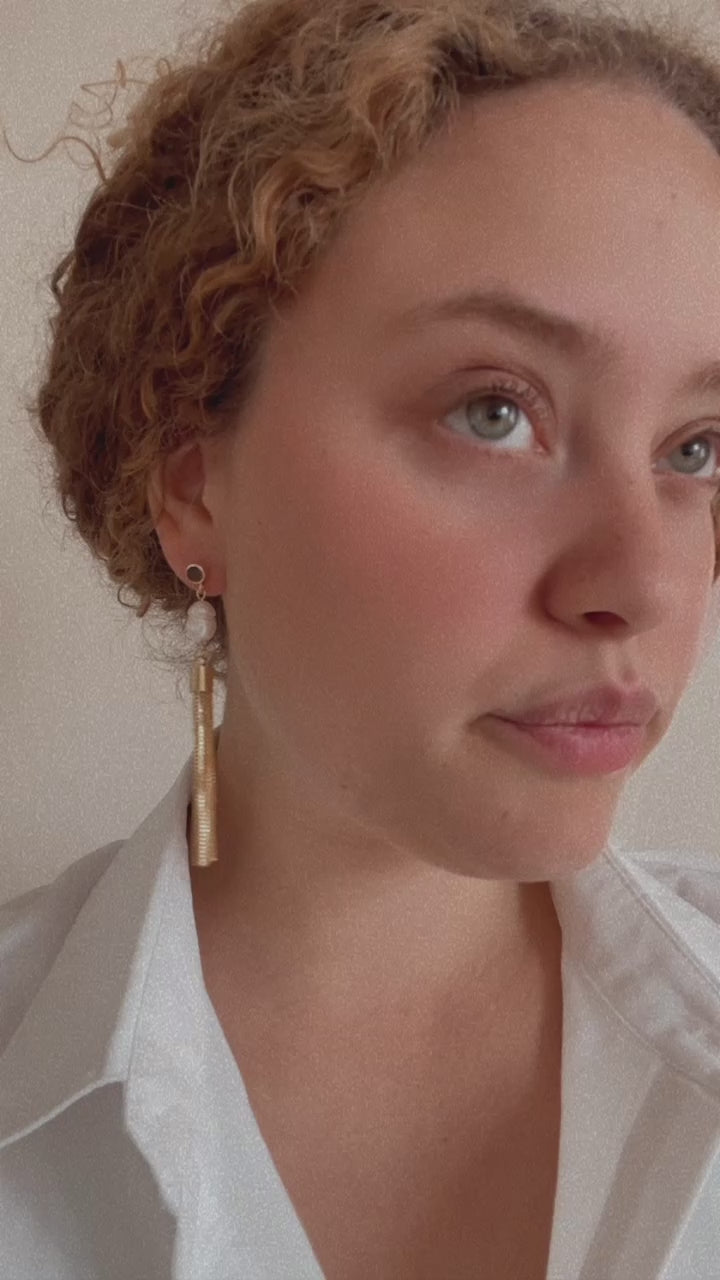 model wearing earring